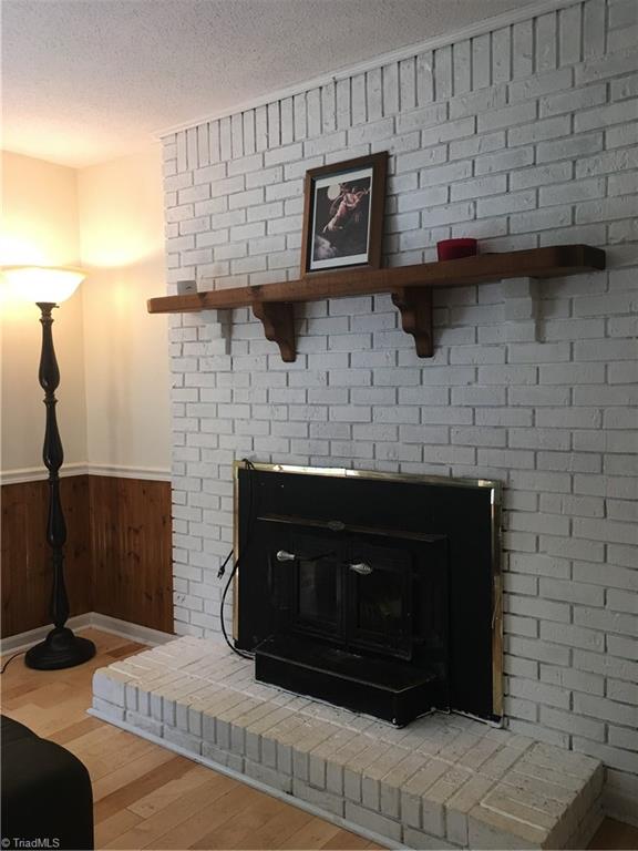 1048 Jackson Road Westfield, NC 27053 - Photo 14 of 30 Beautiful white brick fire place.