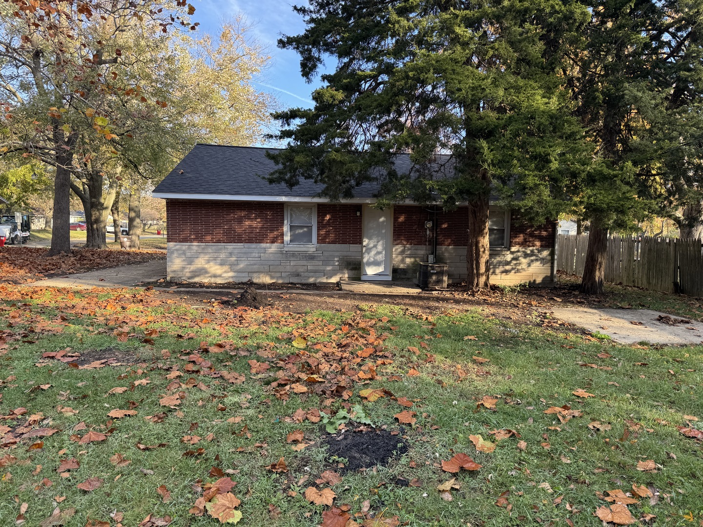 1605 Williamsburg Drive Champaign, IL 61821 - Photo 11 of 11 a view of a house with a yard