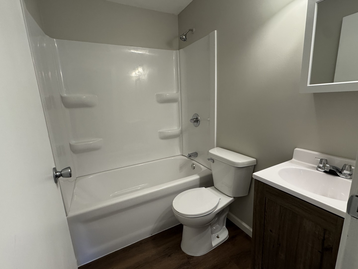 1605 Williamsburg Drive Champaign, IL 61821 - Photo 7 of 11 a bathroom with a toilet and a bathtub