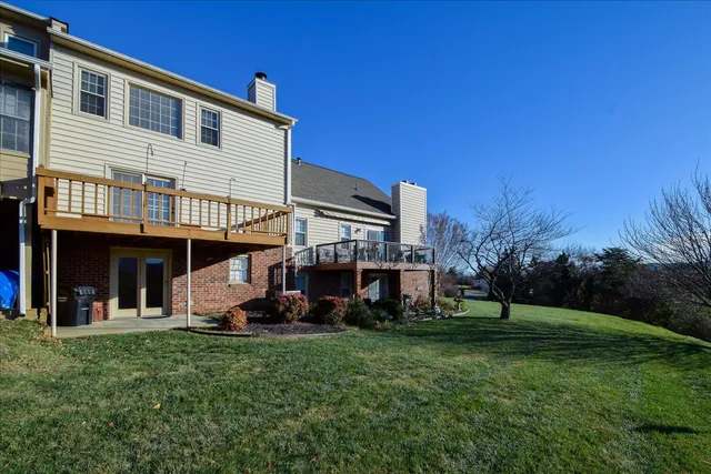 a view of balcony with furniture
