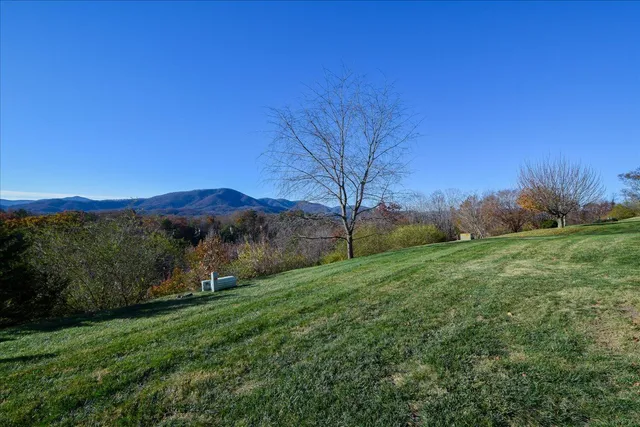 a picture of a book and a white bed