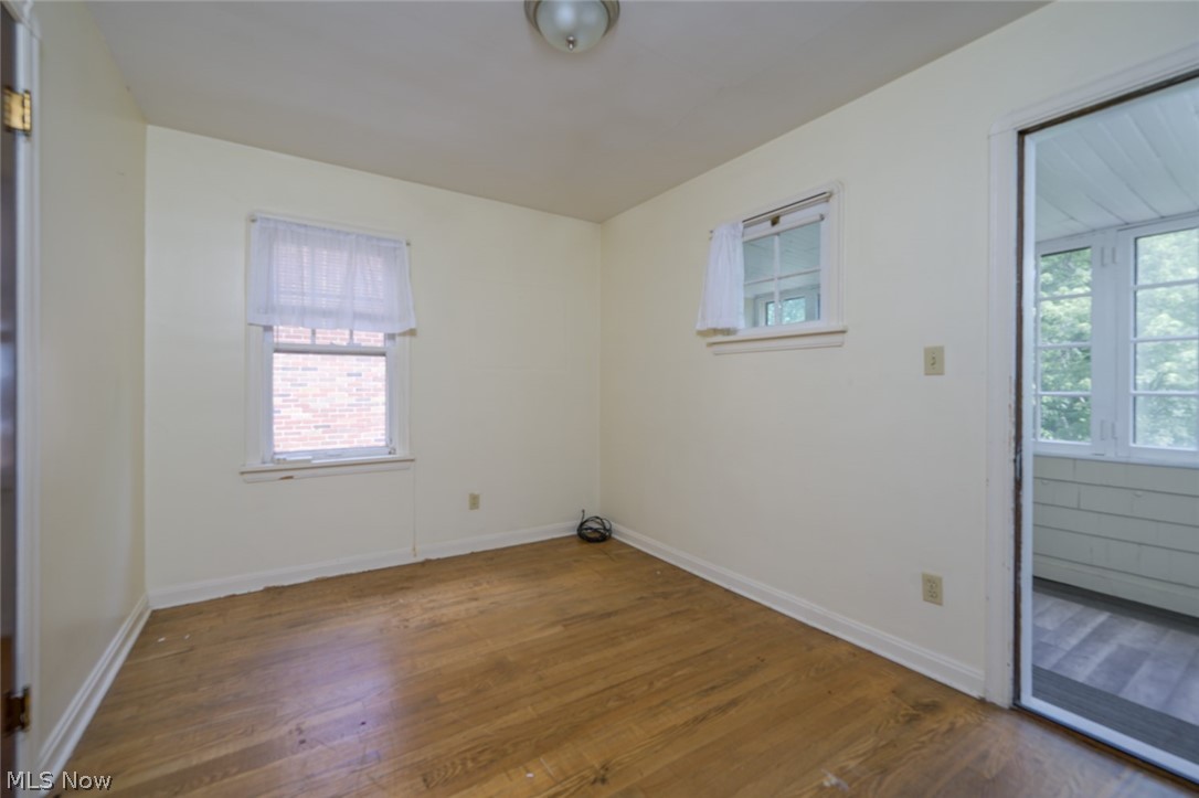 3869 Montevista Road Cleveland, OH 44121 - Photo 20 of 43 Unfurnished room with wood-type flooring
