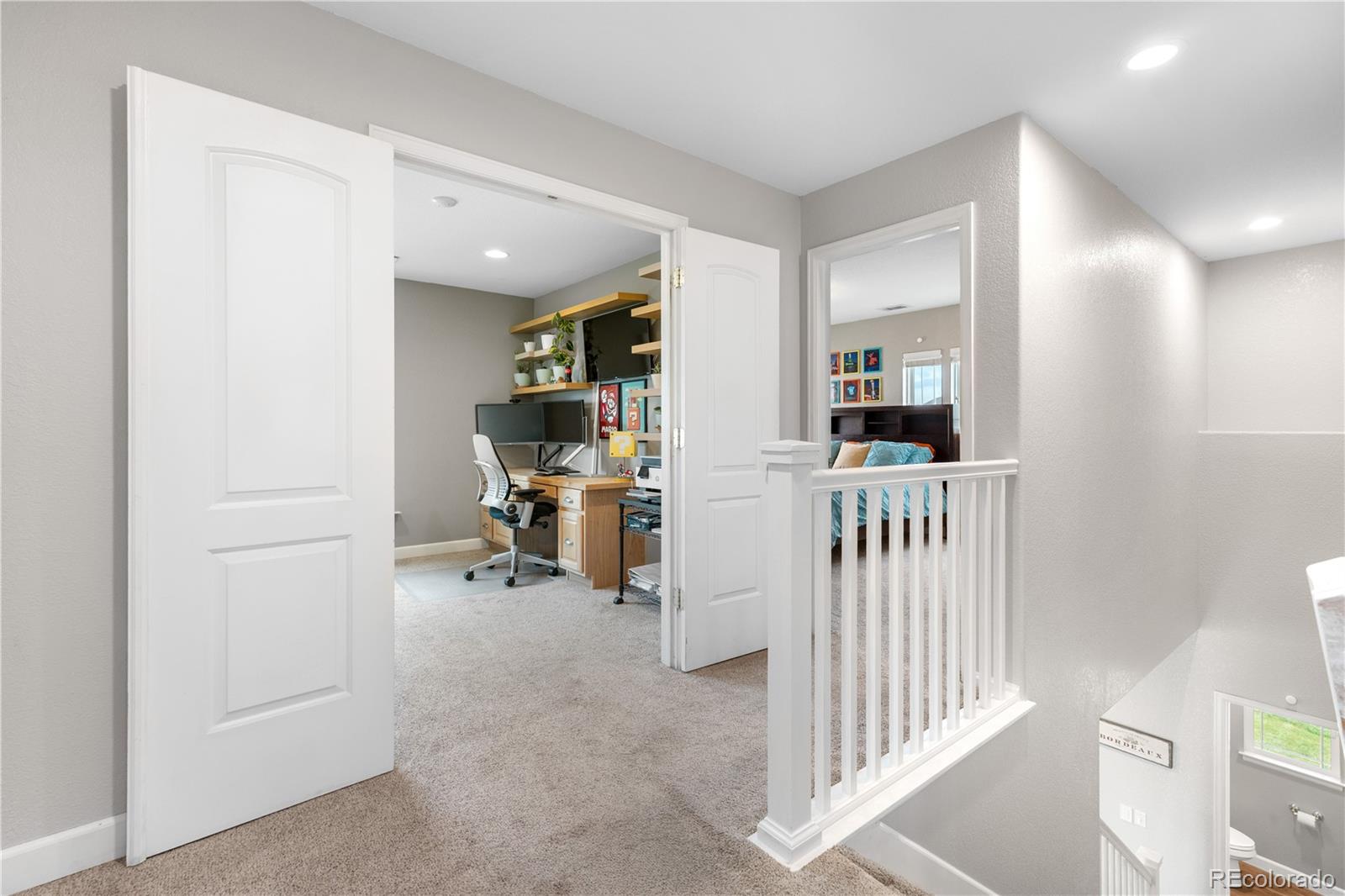 5839 Raleigh Circle Castle Rock, CO 80104 - Photo 24 of 35 a view of a hallway with a livingroom and entryway
