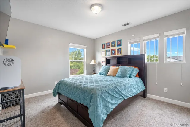 a kitchen with stainless steel appliances a stove and a refrigerator