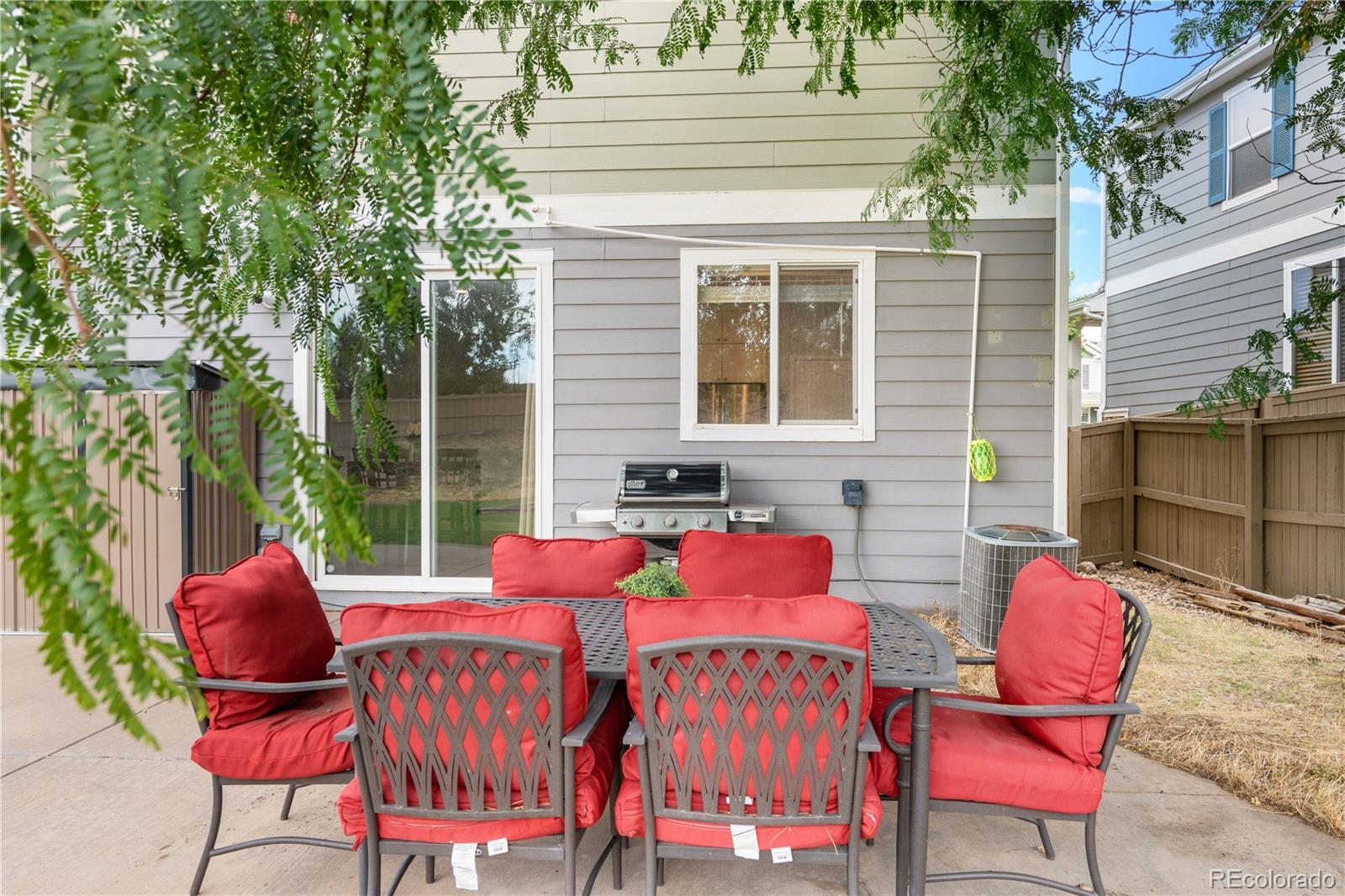 5839 Raleigh Circle Castle Rock, CO 80104 - Photo 34 of 35 a view of a chairs and table in the patio