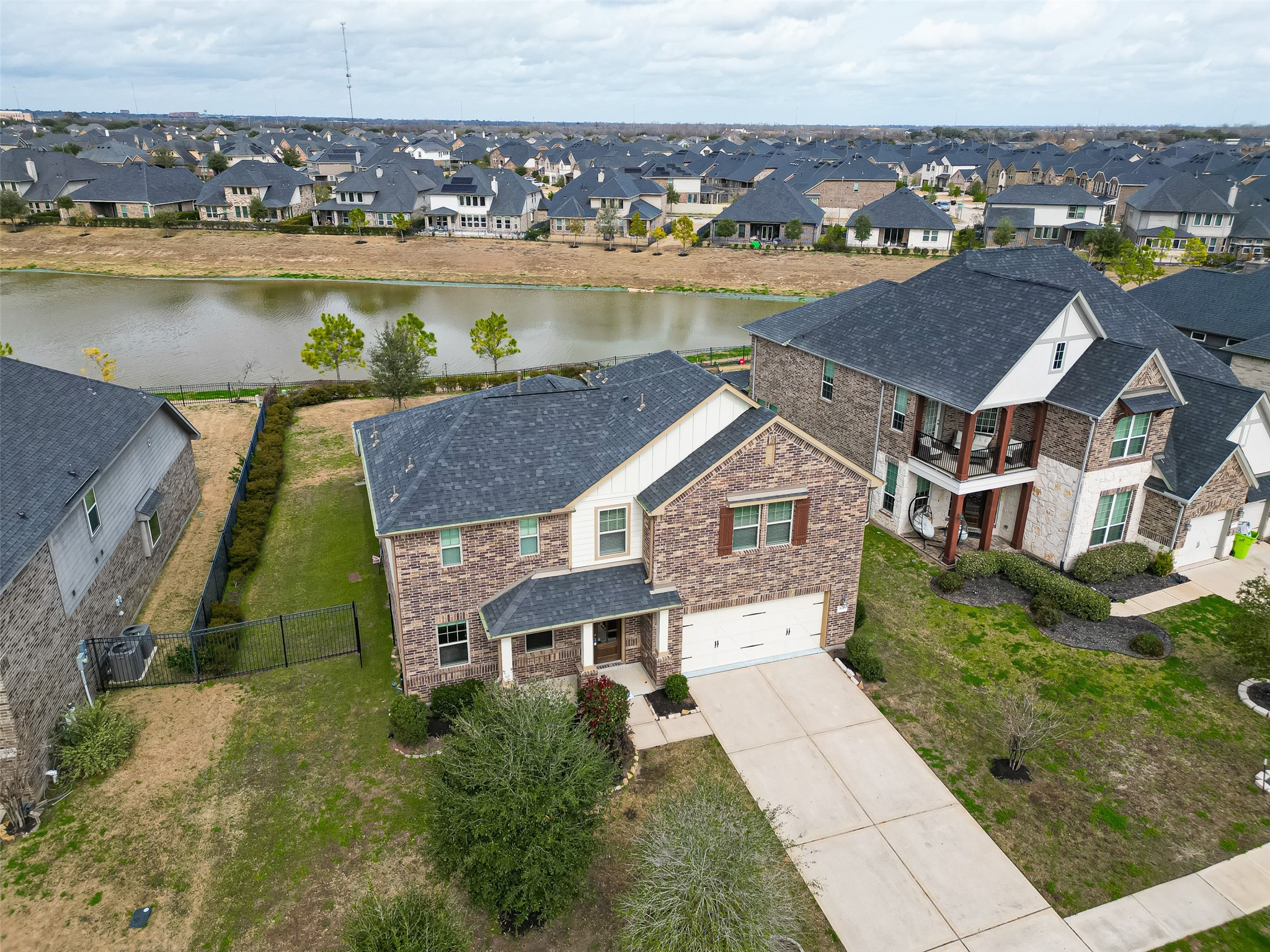 444 Round Lake Drive Rosenberg, TX 77469 - Photo 46 of 50 Bird's eye view of property and lake.