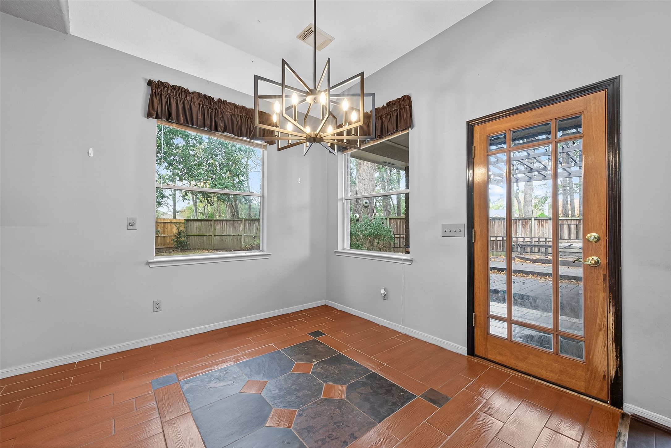 19331 Timber Tree Court Humble, TX 77346 - Photo 15 of 43 a view of an empty room with a window