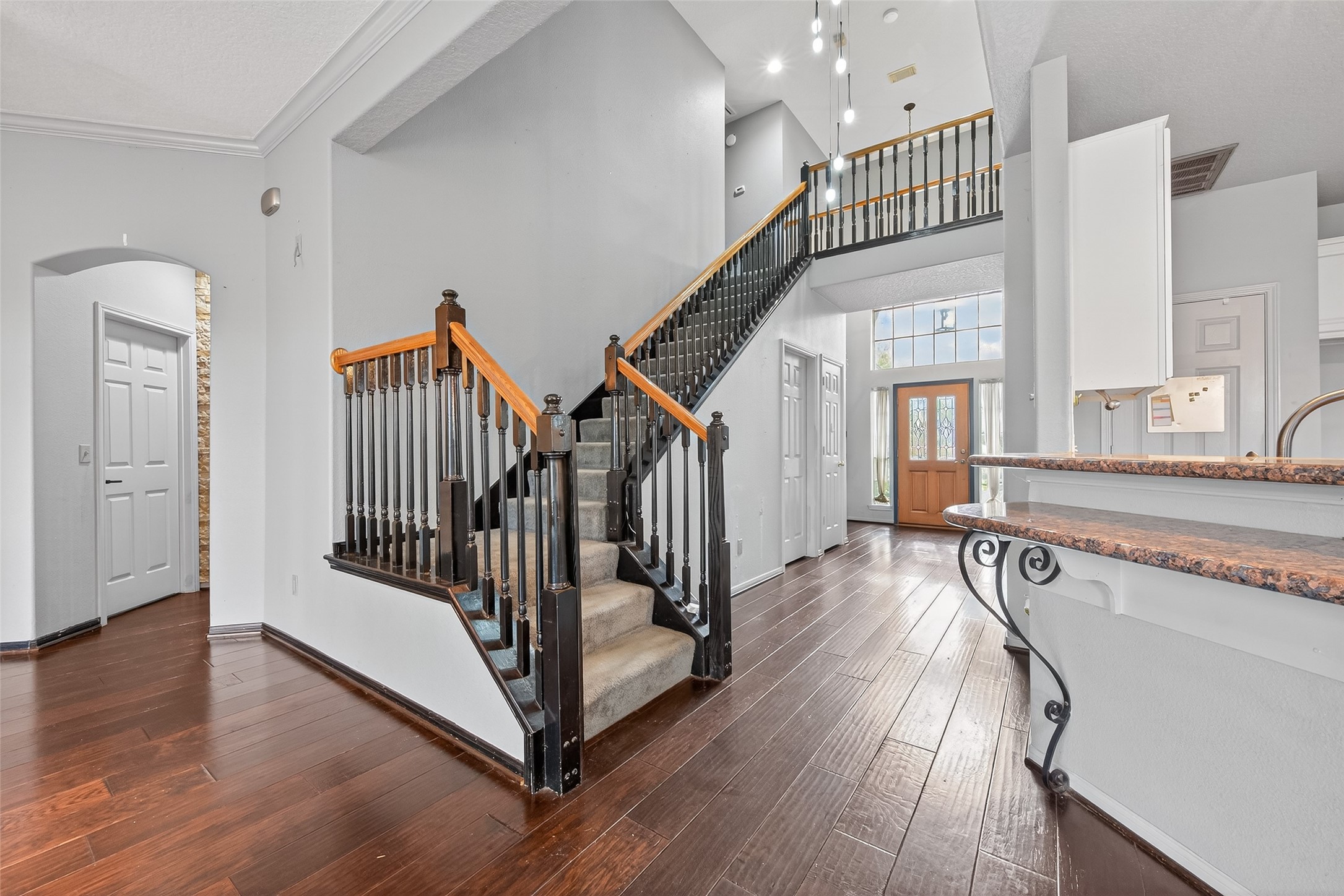 19331 Timber Tree Court Humble, TX 77346 - Photo 19 of 43 a view of entryway and hall with wooden floor