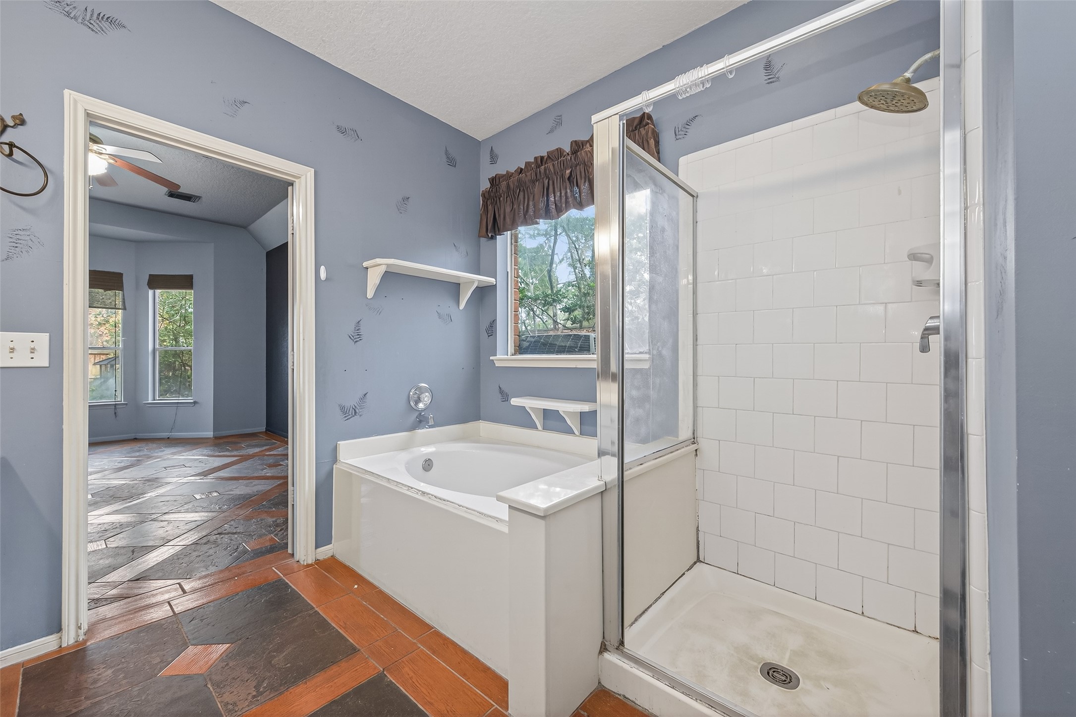 19331 Timber Tree Court Humble, TX 77346 - Photo 24 of 43 a bathroom with a sink a toilet and shower