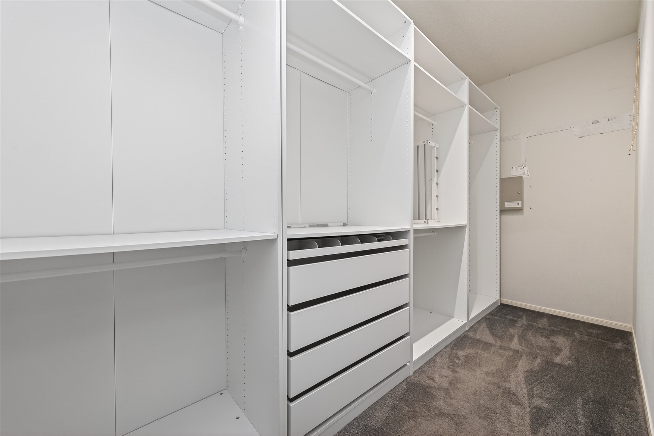 19331 Timber Tree Court Humble, TX 77346 - Photo 27 of 43 a view of an empty walk in closet