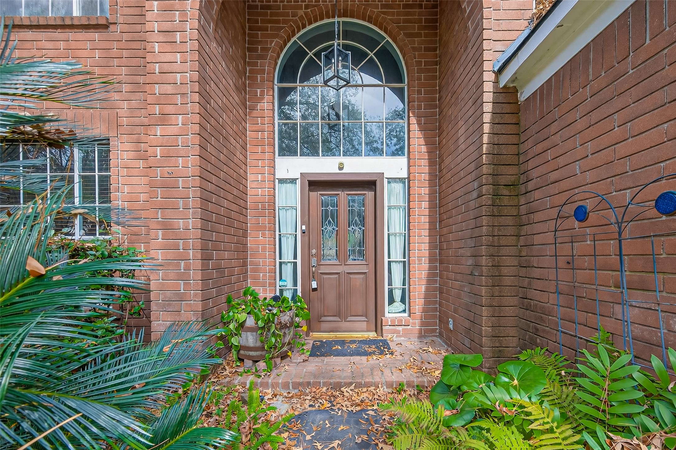19331 Timber Tree Court Humble, TX 77346 - Photo 5 of 43 a front view of a house with a garden