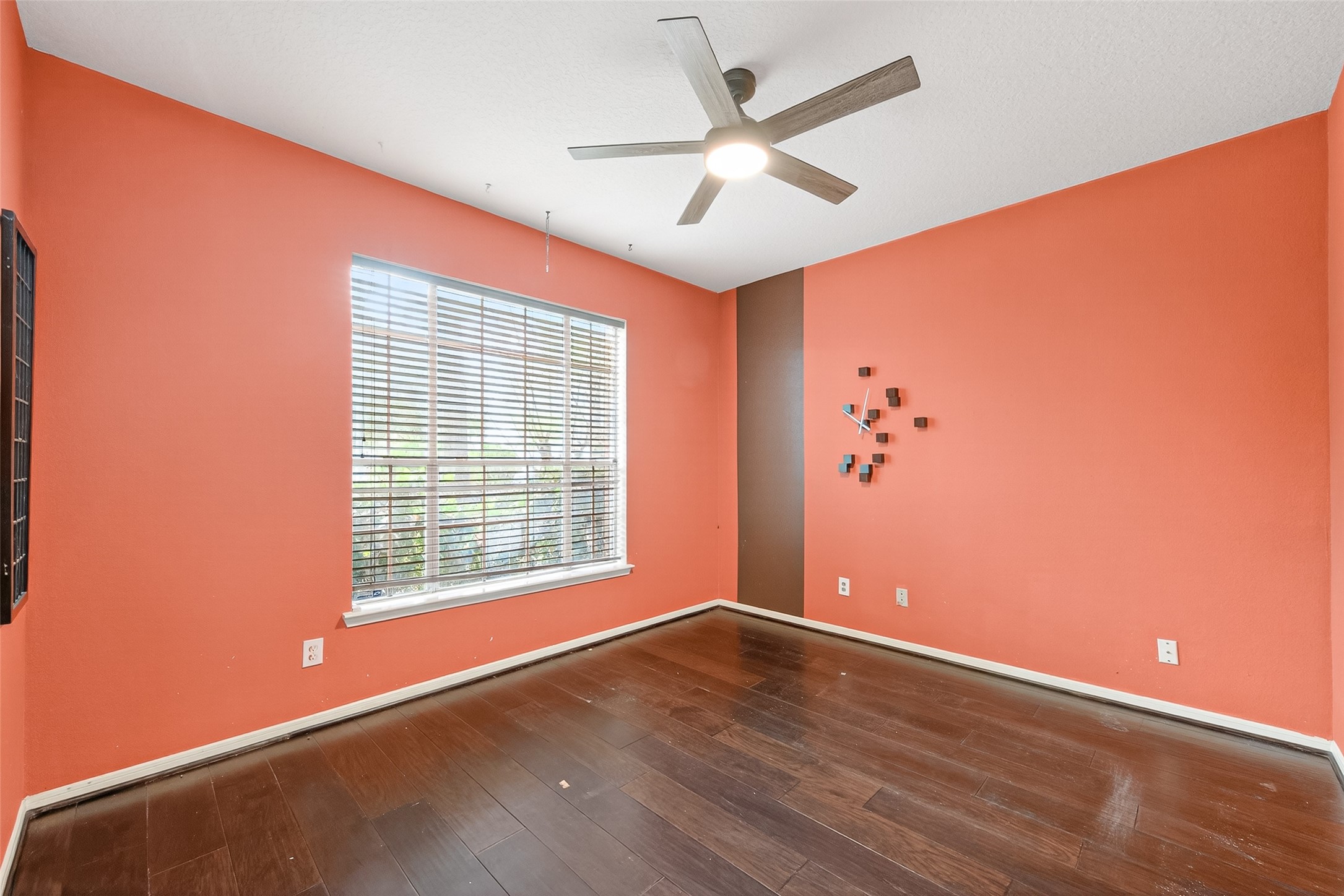 19331 Timber Tree Court Humble, TX 77346 - Photo 8 of 43 an empty room with wooden floor and windows
