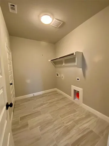 a view of a room with an empty space