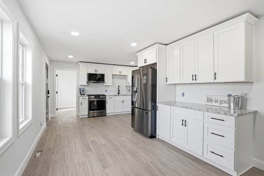 357 Wareham Street Middleboro, MA 02346 - Photo 5 of 42 a kitchen with stainless steel appliances a refrigerator sink and cabinets