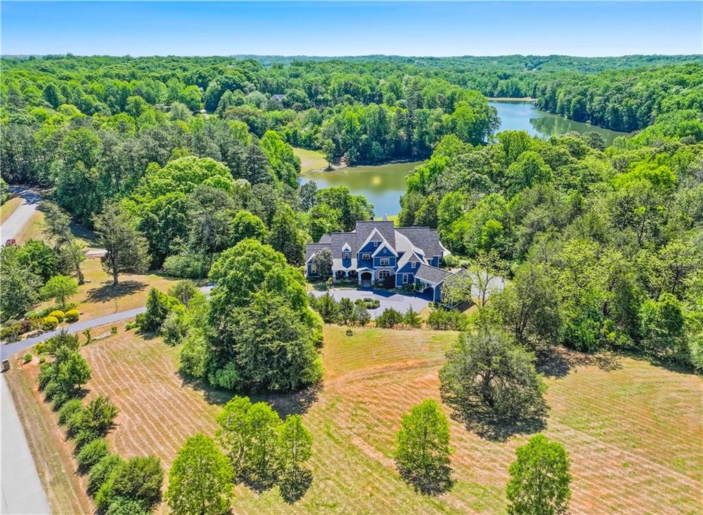62 Cedar Trail Commerce, GA 30529 - Photo 103 of 115 a view of a lake with a yard