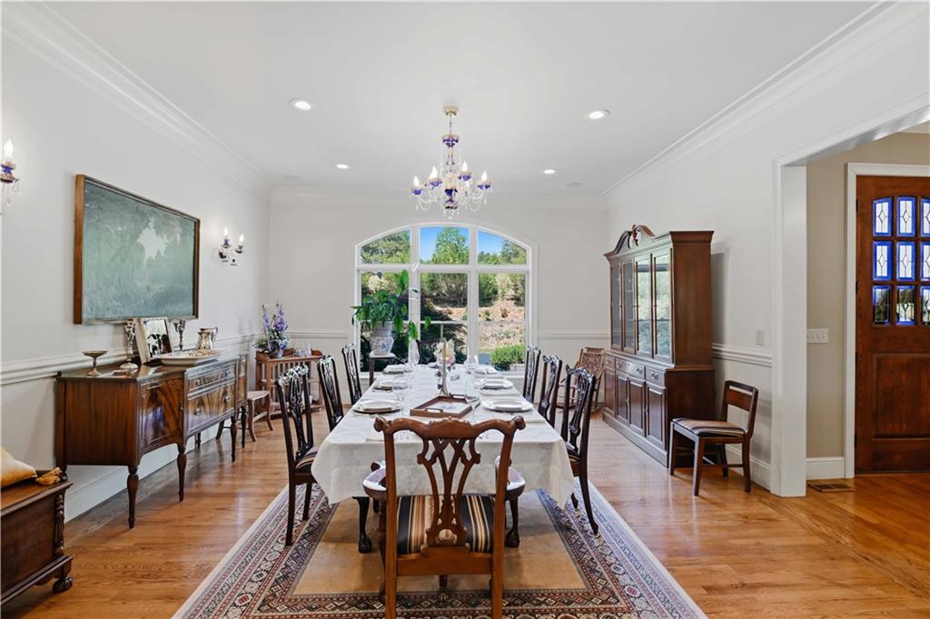 62 Cedar Trail Commerce, GA 30529 - Photo 11 of 115 a view of a dining room with furniture window and wooden floor