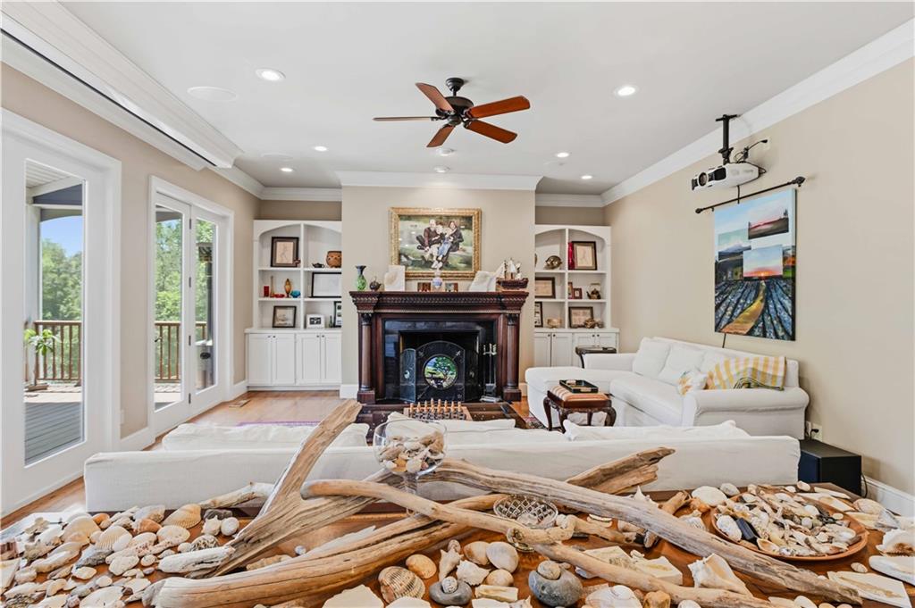 62 Cedar Trail Commerce, GA 30529 - Photo 24 of 115 a living room with furniture and a fireplace