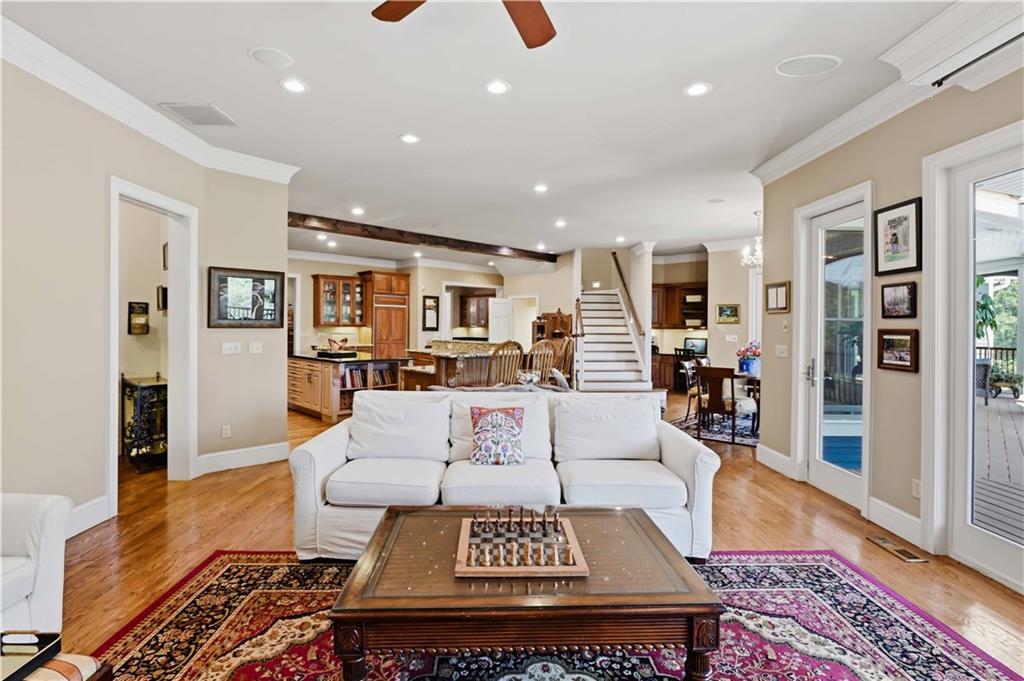 62 Cedar Trail Commerce, GA 30529 - Photo 27 of 115 a living room with furniture a wooden floor and next to a window