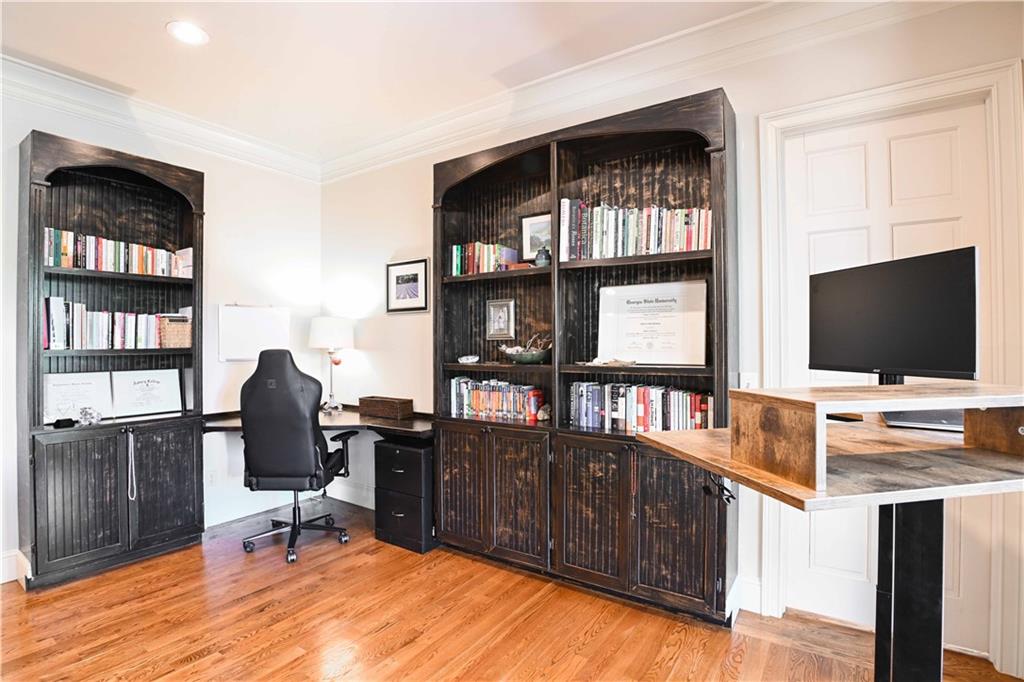62 Cedar Trail Commerce, GA 30529 - Photo 35 of 115 a view of a workspace with furniture and a flat screen tv