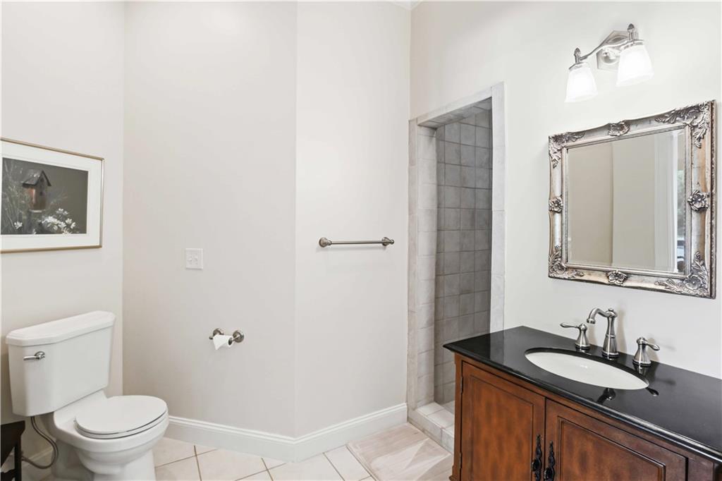 62 Cedar Trail Commerce, GA 30529 - Photo 44 of 115 a bathroom with a granite countertop sink toilet and shower