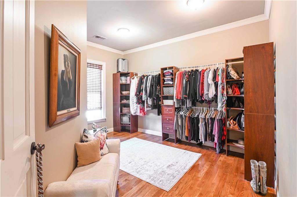 62 Cedar Trail Commerce, GA 30529 - Photo 47 of 115 a living room with lots of furniture and clothes