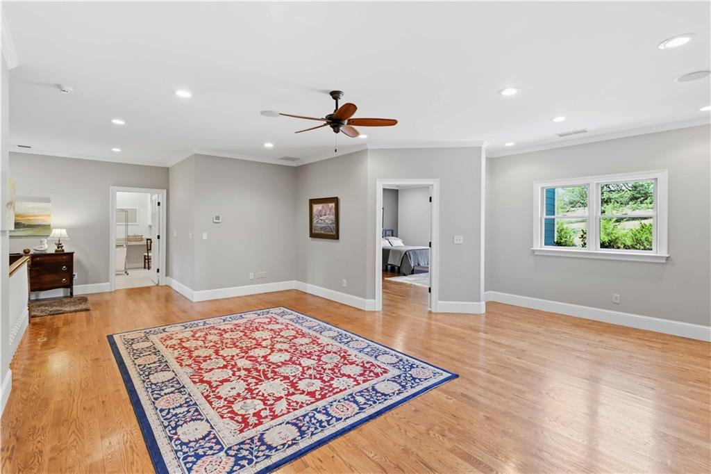 62 Cedar Trail Commerce, GA 30529 - Photo 53 of 115 wooden floor in an empty room with a rug