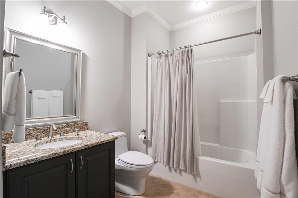 62 Cedar Trail Commerce, GA 30529 - Photo 59 of 115 a bathroom with a granite countertop sink toilet and shower