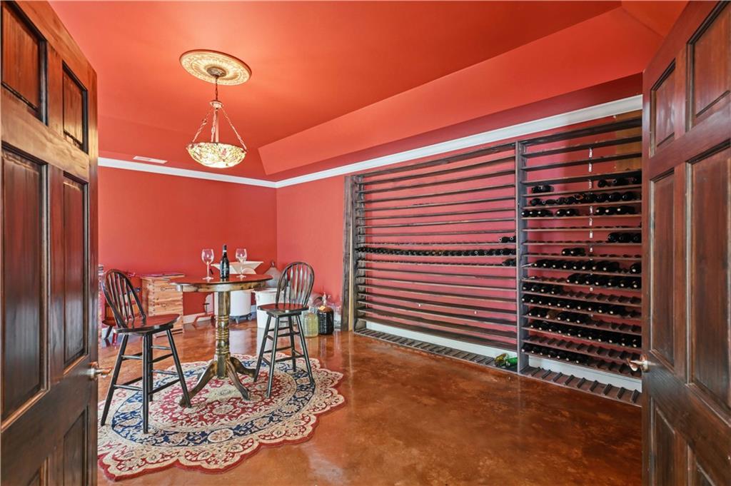 62 Cedar Trail Commerce, GA 30529 - Photo 75 of 115 a dining room with a table and chairs