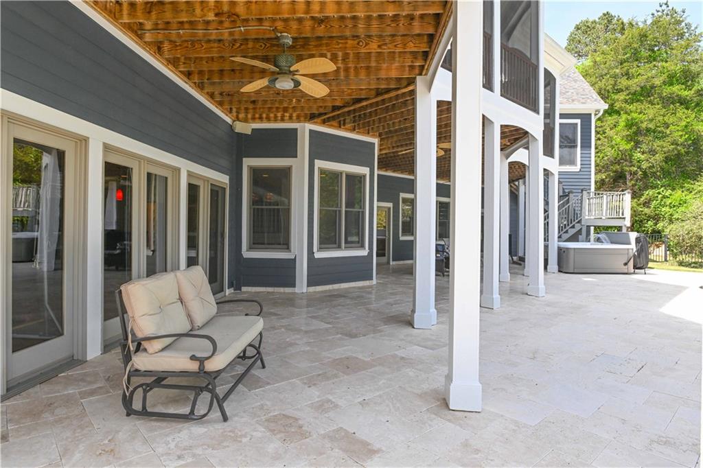 62 Cedar Trail Commerce, GA 30529 - Photo 95 of 115 a view of a patio with chair and tables