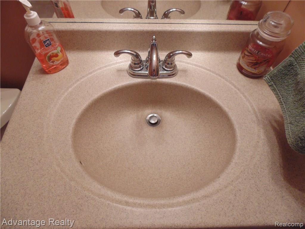 6960 West Gates Street Romeo, MI 48065 - Photo 52 of 91 Basement bathroom has corian sink!