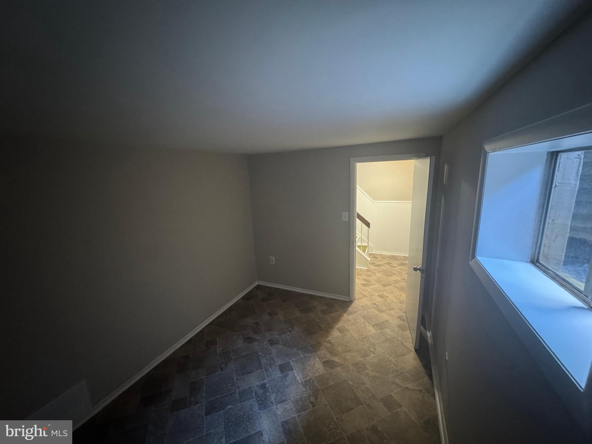 8958 Centerway Road Gaithersburg, MD 20879 - Photo 19 of 37 a view of an empty room and window