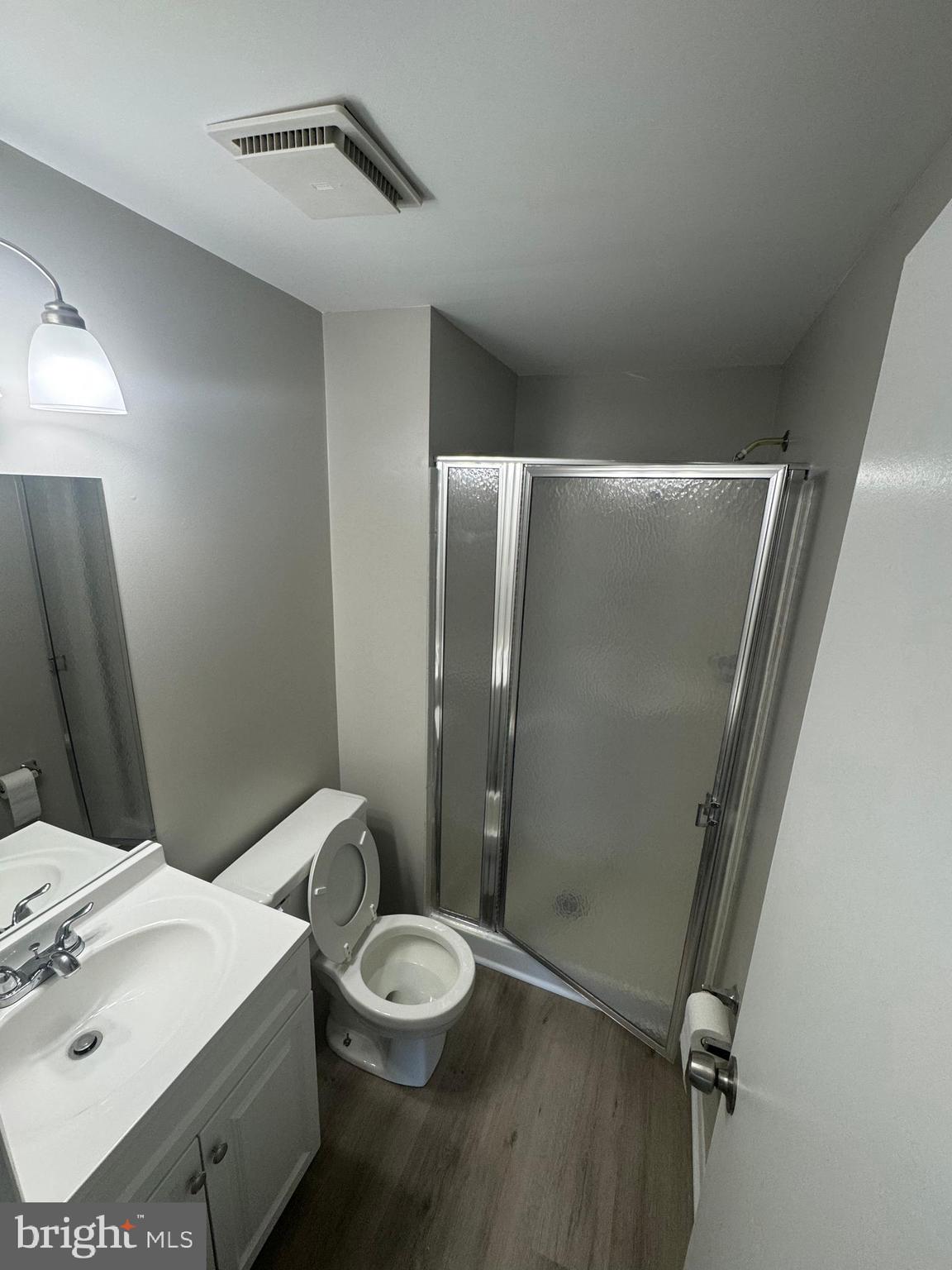 8958 Centerway Road Gaithersburg, MD 20879 - Photo 25 of 37 a bathroom with a sink a toilet and shower