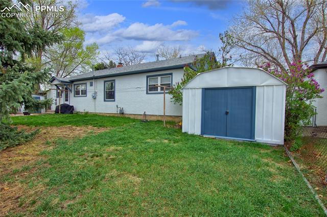 2354 Valley Forge Road Colorado Springs, CO 80907 - Photo 19 of 20 BACK YARD WITH SHED