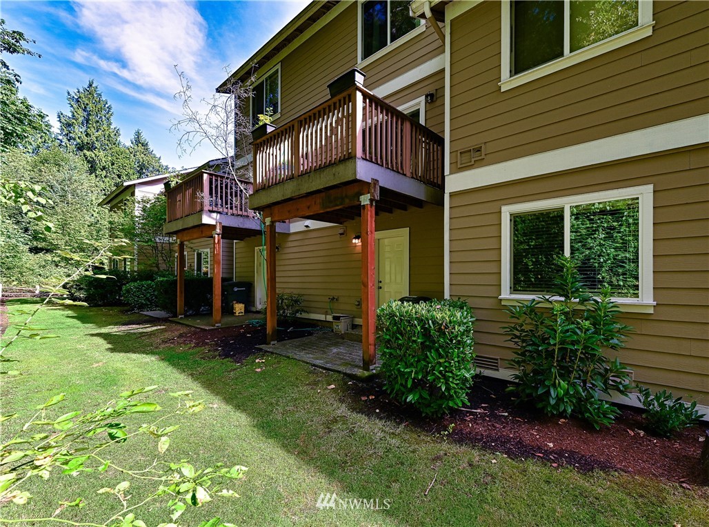 21334 11th Drive Southeast Bothell, WA 98021 - Photo 27 of 29 a view of a house with a yard and sitting area