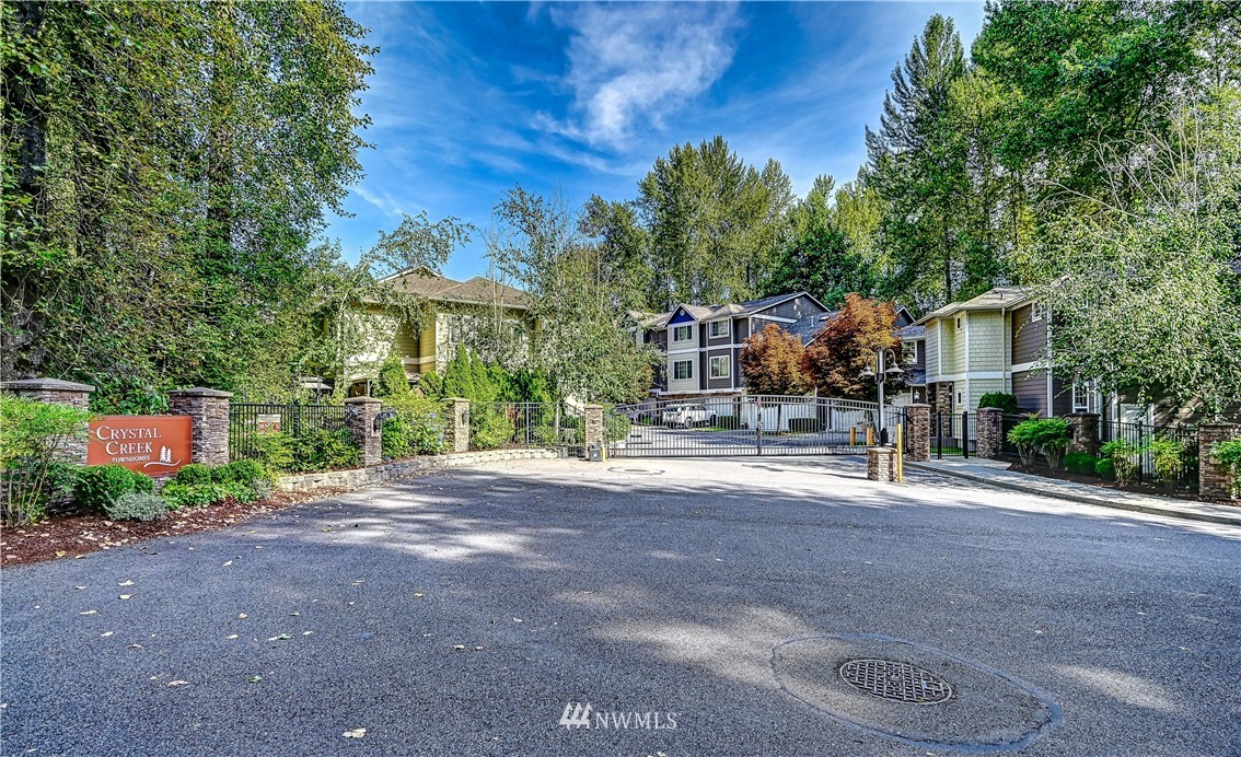 21334 11th Drive Southeast Bothell, WA 98021 - Photo 29 of 29 a front view of a house with a yard and potted plants