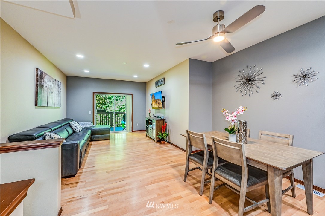 21334 11th Drive Southeast Bothell, WA 98021 - Photo 5 of 29 a dining room with furniture and wooden floor