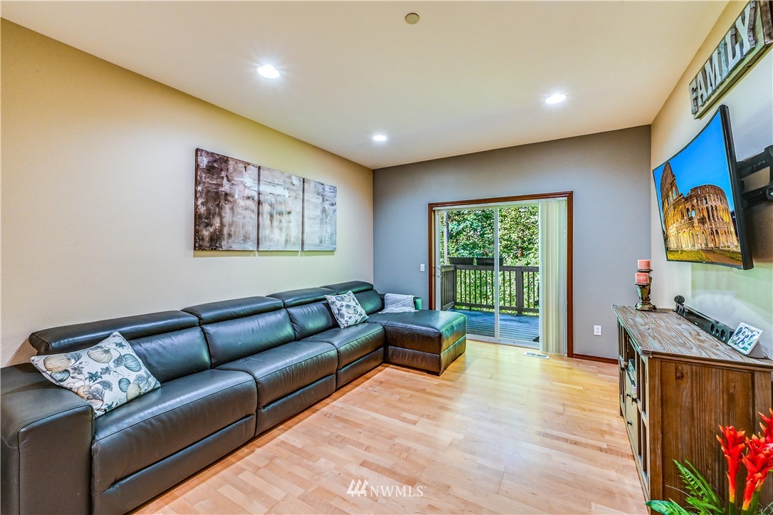 21334 11th Drive Southeast Bothell, WA 98021 - Photo 6 of 29 a living room with furniture and a flat screen tv