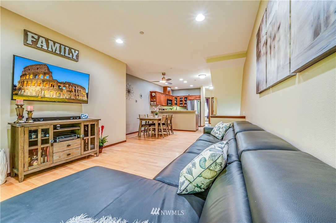 21334 11th Drive Southeast Bothell, WA 98021 - Photo 7 of 29 a living room with furniture and a flat screen tv