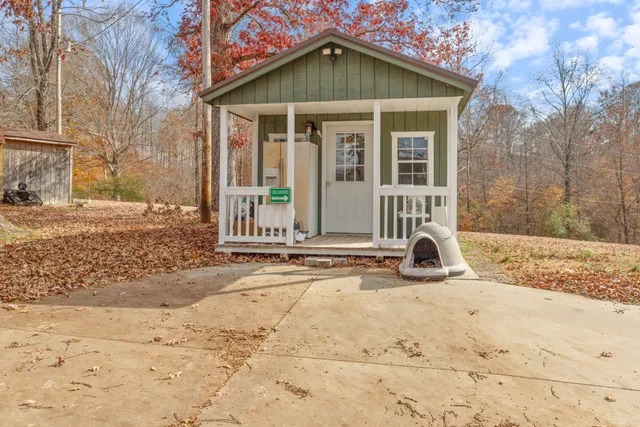 a view of a house with snow on the ground