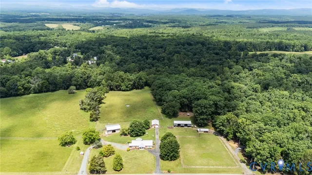 an aerial view of residential house with outdoor space