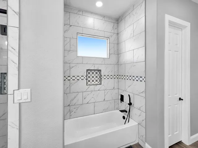 a bathroom with a bathtub