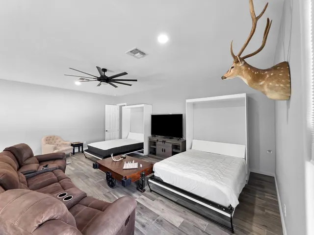 a bedroom with a bed and furniture