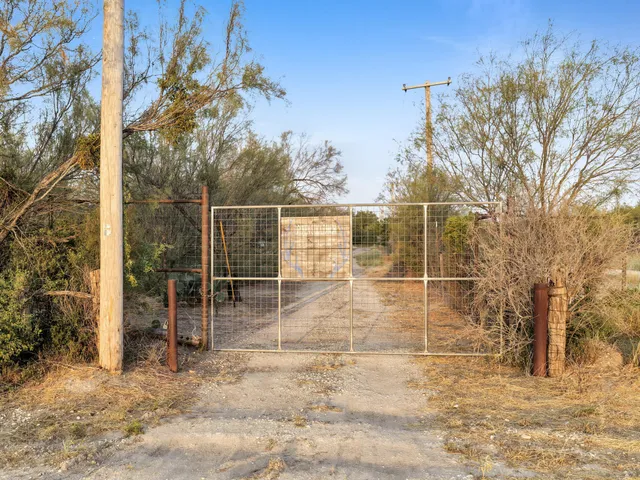 an aerial view of a city with ocean view
