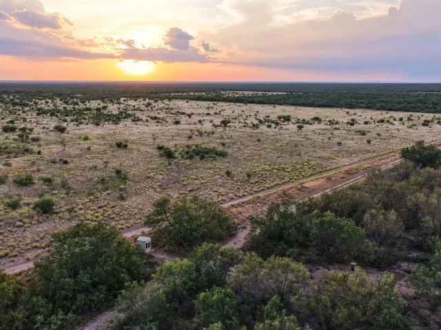 a view of lake with green space