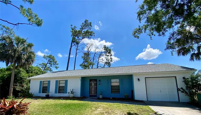 a view of a house with a swimming pool