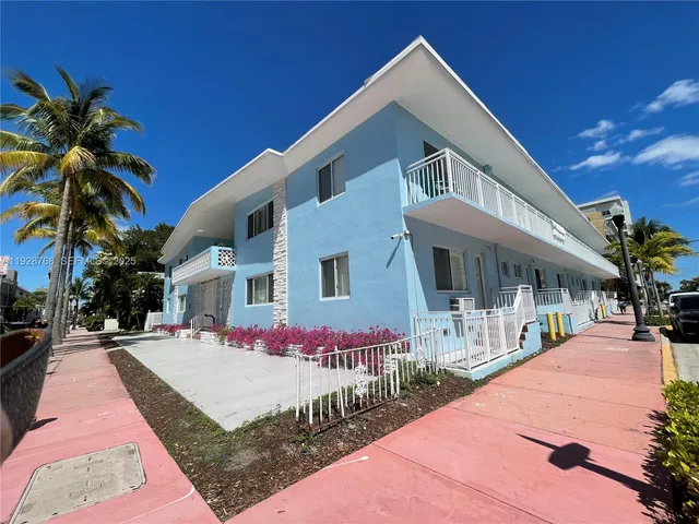 a view of balcony with wooden floor