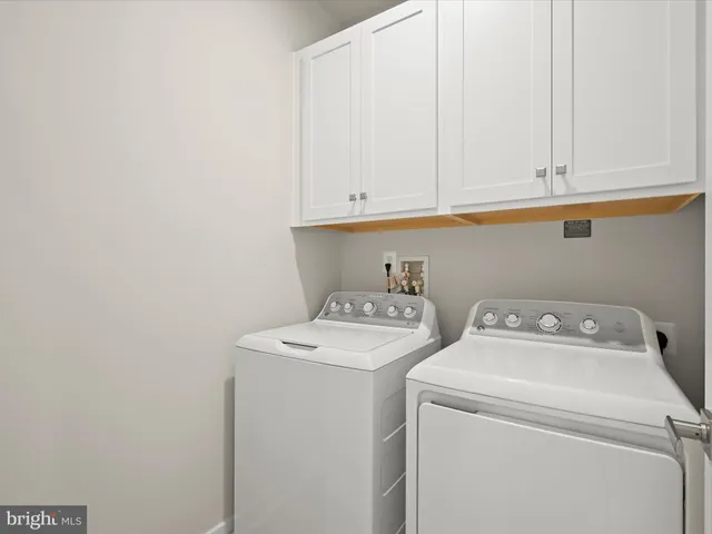 a view of a chairs and table in patio