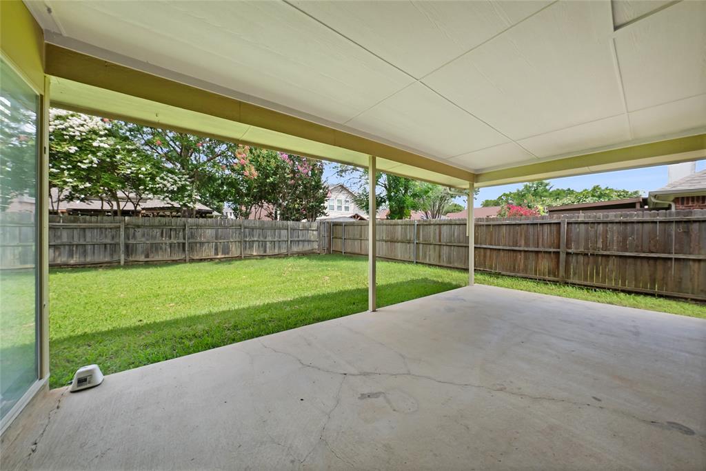2910 Chisholm Trail Corinth, TX 76210 - Photo 27 of 30 a view of a yard with porch