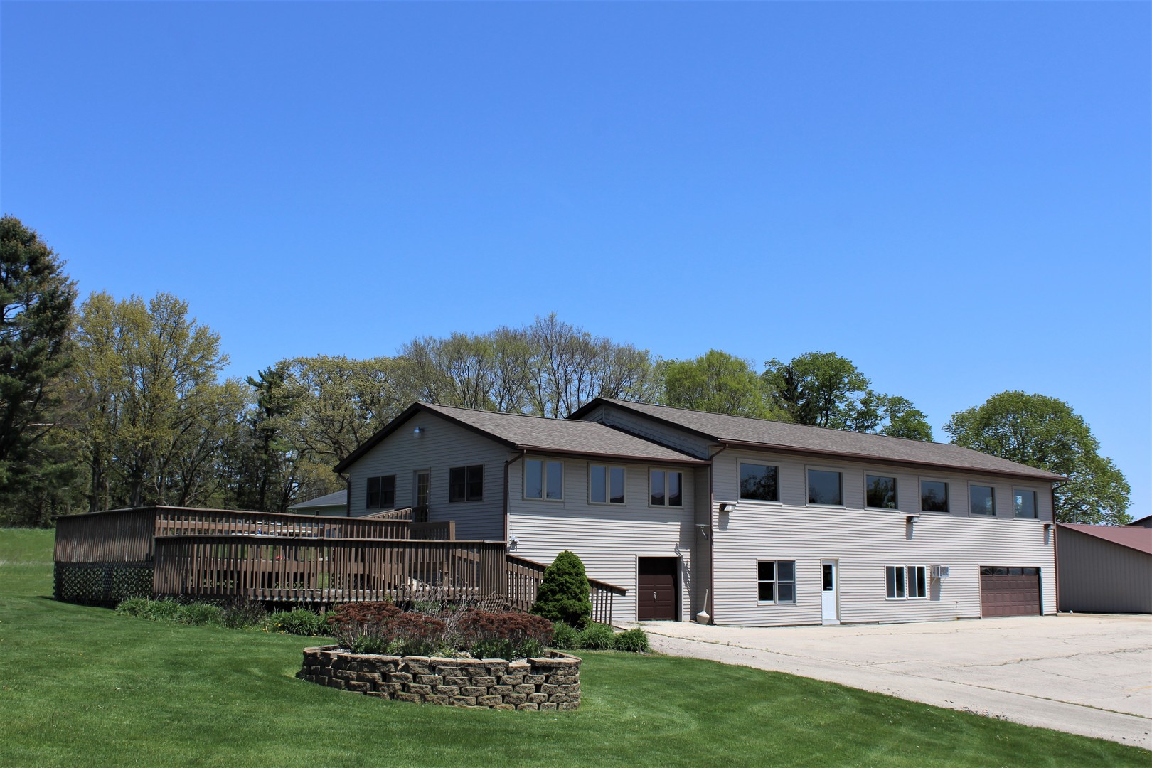 15523 Henry Road Morrison, IL 61270 - Photo 1 of 16 a house view with a garden space