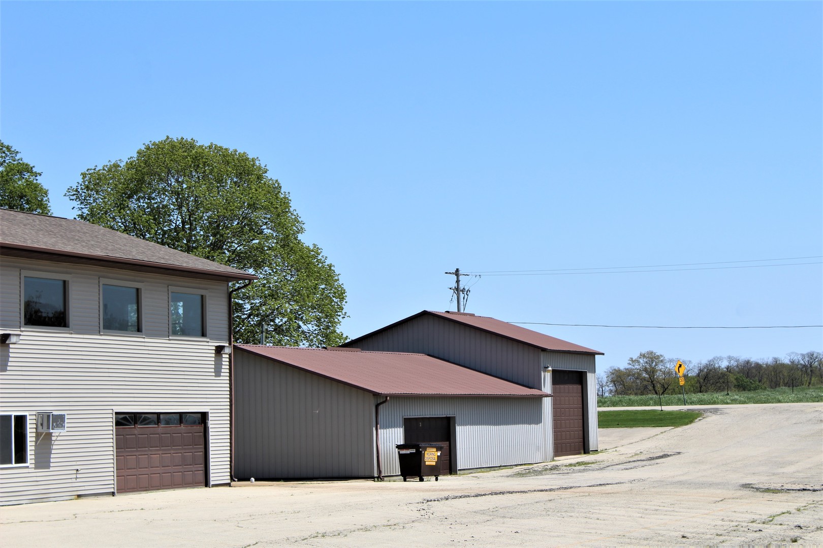 15523 Henry Road Morrison, IL 61270 - Photo 4 of 16 a house with trees in the background